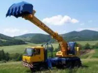 Экскаватор-планировщик UDS 214 John Deere / 140 л. с.